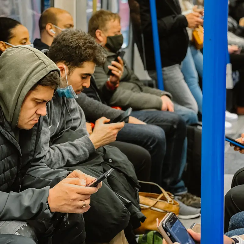 Subway passengers testing games on their phones before losing WiFi