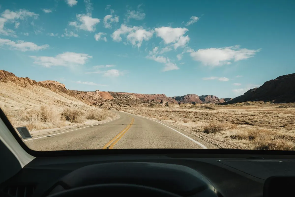An open road while preparing offline games for a long road trip